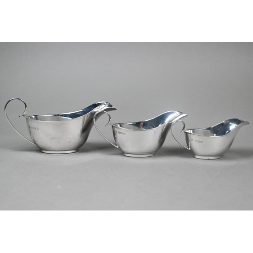 41 - A graduated set of three silver sauce boats, Barker Brothers Silver Ltd, Birmingham 1933, 9.3oz