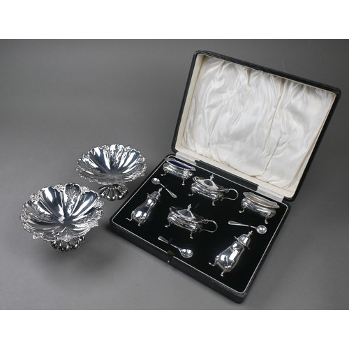 42 - A cased silver six-piece condiment set, Adie Brothers Ltd., Birmingham 1929, to/w a pair of pierced ... 