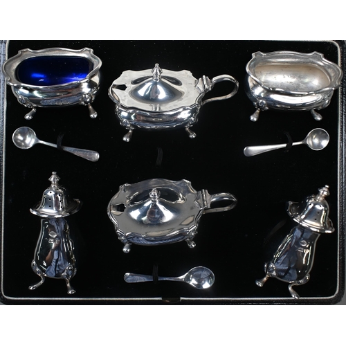 42 - A cased silver six-piece condiment set, Adie Brothers Ltd., Birmingham 1929, to/w a pair of pierced ... 