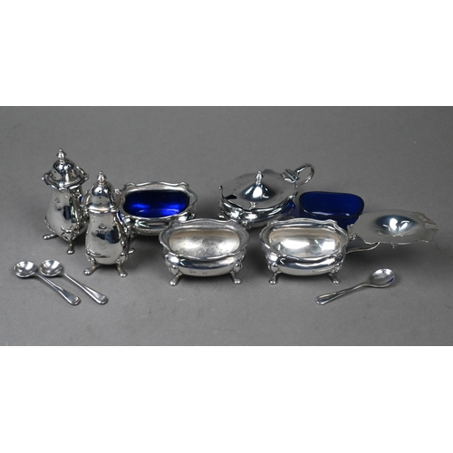 42 - A cased silver six-piece condiment set, Adie Brothers Ltd., Birmingham 1929, to/w a pair of pierced ... 