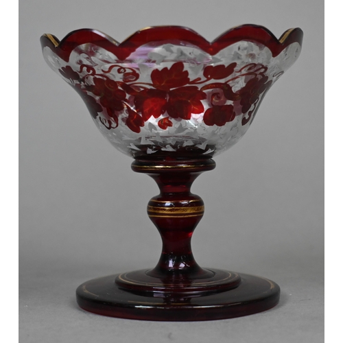 421 - A pair of 19th century continental ruby flash decanters with vine-etched decoration, 19.5 cm, to/w a... 