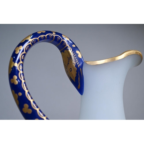 422 - A 19th century Venetian frosted glass jug of baluster form with blue and gilt winding 'snake' handle... 