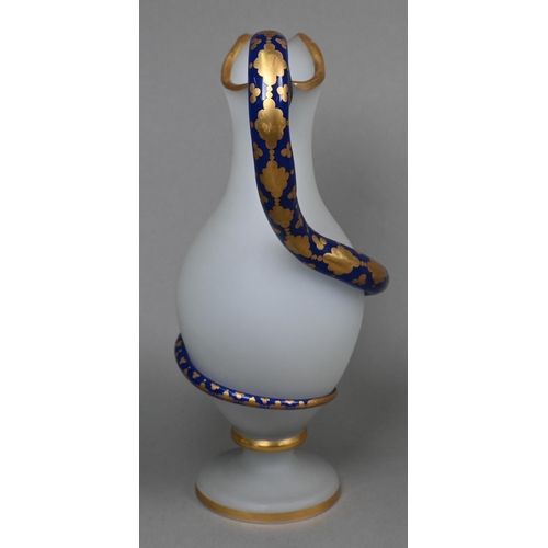 422 - A 19th century Venetian frosted glass jug of baluster form with blue and gilt winding 'snake' handle... 