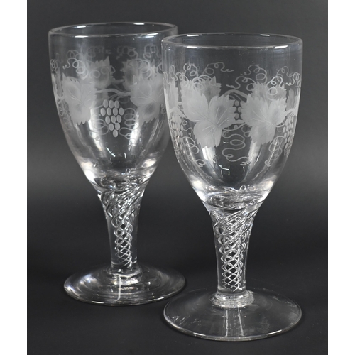 424 - A large pair of antique vine-etched goblets with airtwist stems and flamed foot with pontil mark (2)