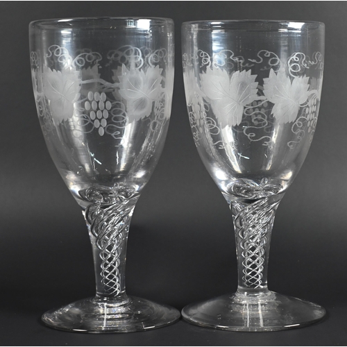 424 - A large pair of antique vine-etched goblets with airtwist stems and flamed foot with pontil mark (2)