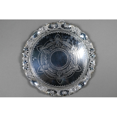 43 - A Victorian silver letter salver with engraved decoration and embossed and pierced rim, William Deve... 