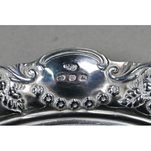 43 - A Victorian silver letter salver with engraved decoration and embossed and pierced rim, William Deve... 