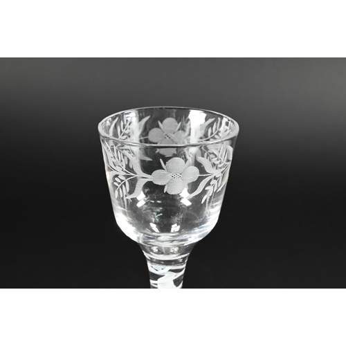 430 - A Georgian cordial glass with floral etched tapering bowl on opaque twist stem and conical foot with... 