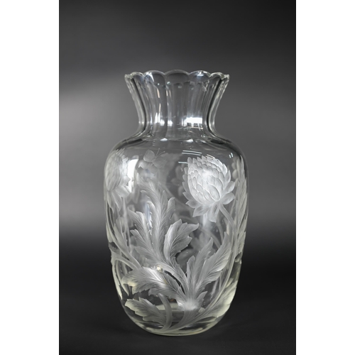 432 - A vintage glass vase, deep-cut with chrysanthemums and butterflies, 27 cm high