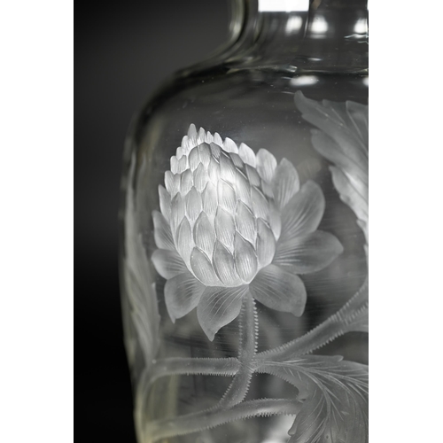 432 - A vintage glass vase, deep-cut with chrysanthemums and butterflies, 27 cm high