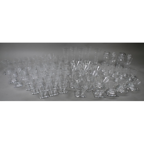 442 - An extensive suite of Webb Art Deco drinking glasses with angular cut design, conical bowls on squar... 