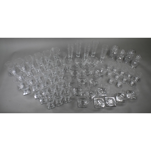 442 - An extensive suite of Webb Art Deco drinking glasses with angular cut design, conical bowls on squar... 