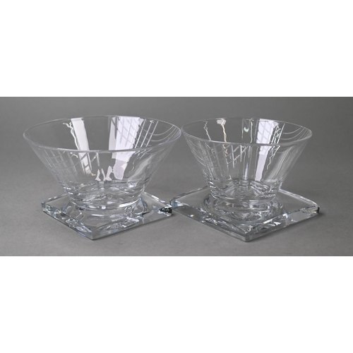 442 - An extensive suite of Webb Art Deco drinking glasses with angular cut design, conical bowls on squar... 