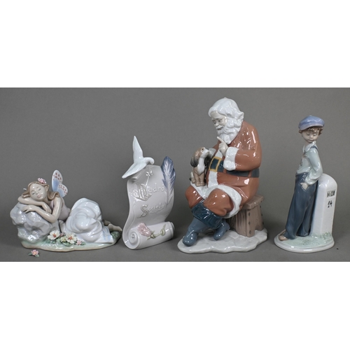 445 - A boxed Lladro 'Santa's Magical Workshop' figure 6390, to/w four other figures 'Princess of the Fair... 