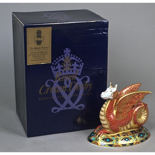 450 - A boxed Royal Crown Derby paperweight, 'The Wessex Wyvern' with gold stopper, no.502/2000, 2004