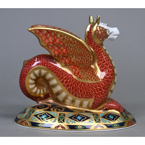 450 - A boxed Royal Crown Derby paperweight, 'The Wessex Wyvern' with gold stopper, no.502/2000, 2004