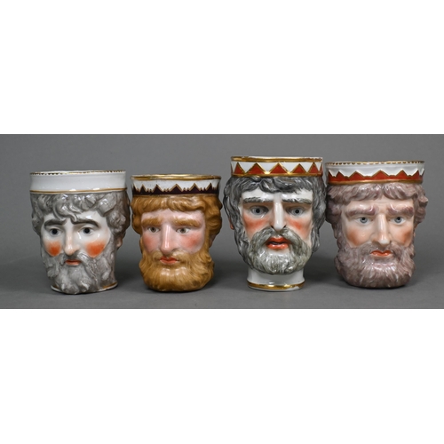 457 - A collection of six Georgian Derby 'Neptune' mask mugs, to/w two Bacchanalian examples (8)