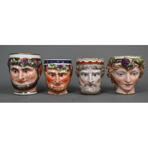 457 - A collection of six Georgian Derby 'Neptune' mask mugs, to/w two Bacchanalian examples (8)