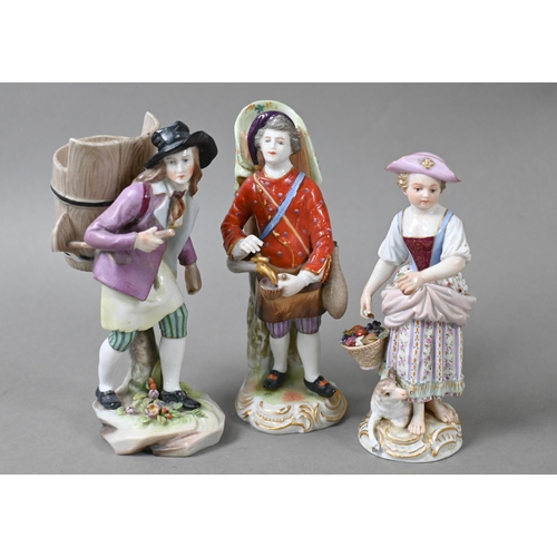 466 - A 19th century German small figure of a shepherdess (cancelled Meissen mark) 13 cm, to/w two Volkste... 