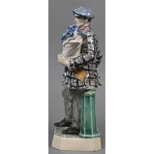 469 - A Charles Vyse Chelsea pottery figure, 'The Cinneraria Boy', blue painted 'CV (monogram) Chelsea 192... 