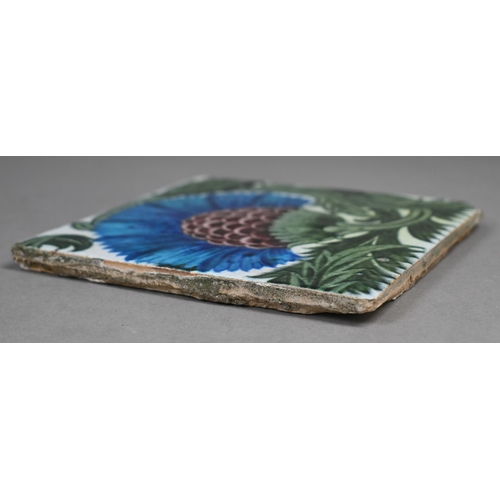 472 - A William De Morgan (Fulham period) tile with floral and foliate design in blue, brown and green, 15... 