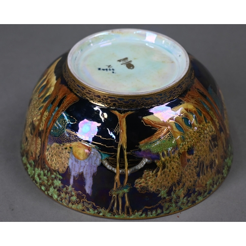 475 - A Daisy Makeig-Jones for Wedgwood Fairyland lustre bowl with painted and gilded landscape to the out... 