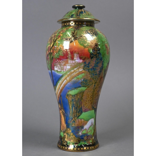 477 - A Daisy Makeig-Jones for Wedgwood Fairyland lustre vase and cover with painted and gilded fairies in... 