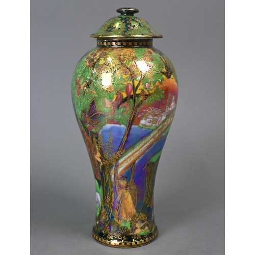 477 - A Daisy Makeig-Jones for Wedgwood Fairyland lustre vase and cover with painted and gilded fairies in... 