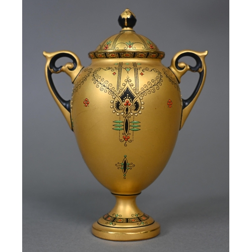 481 - A Royal Worcester small gilt urn and cover with twin handles and stemmed foot, the sparse foliate de... 