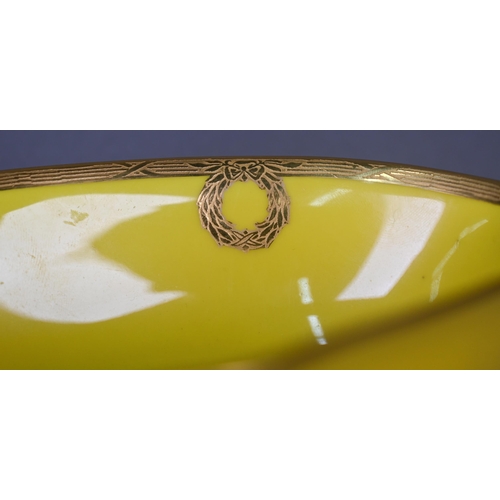 482 - A Royal Worcester oval bowl, painted with flowers by Edward Phillips, signed, on yellow ground, the ... 