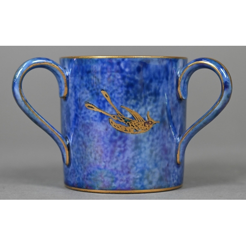 483 - A Wedgwood lustre small bowl and loving cup with mottled blue exteriors and mottled orange interiors... 