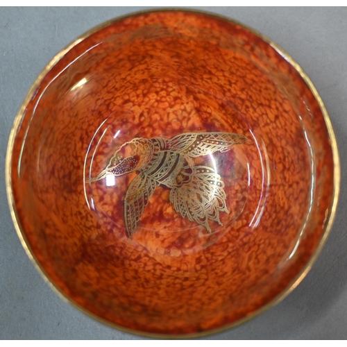 483 - A Wedgwood lustre small bowl and loving cup with mottled blue exteriors and mottled orange interiors... 