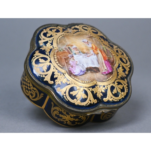 486 - A 19th century French porcelain box of lobed form with gilt brass hinges, the cover painted with int... 