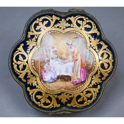 486 - A 19th century French porcelain box of lobed form with gilt brass hinges, the cover painted with int... 