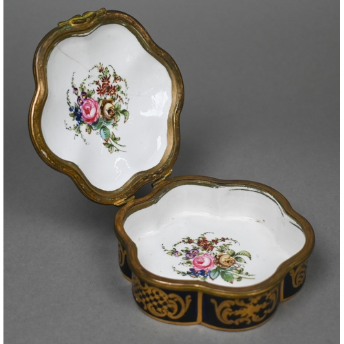 486 - A 19th century French porcelain box of lobed form with gilt brass hinges, the cover painted with int... 