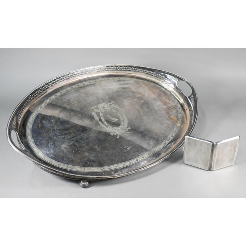 6 - A large Edwardian Regency Revival epns oval tray with pierced rim and engraved decoration, on bun fe... 