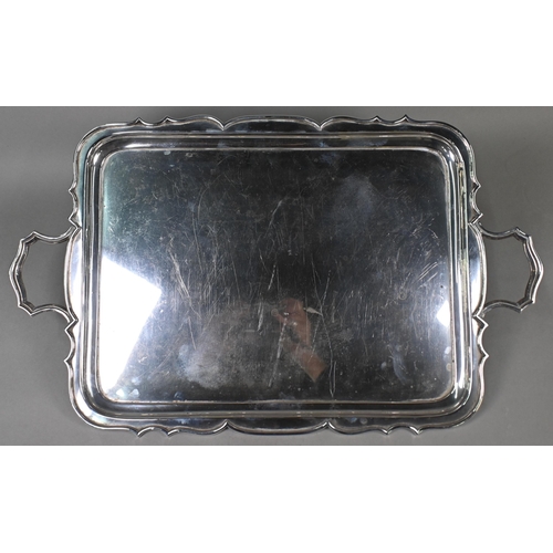 64 - A heavy quality silver two-handled tray with shaped rim, James Dixon & Son, Sheffield 1935, 70oz... 