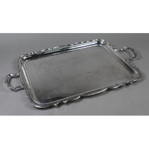 64 - A heavy quality silver two-handled tray with shaped rim, James Dixon & Son, Sheffield 1935, 70oz... 