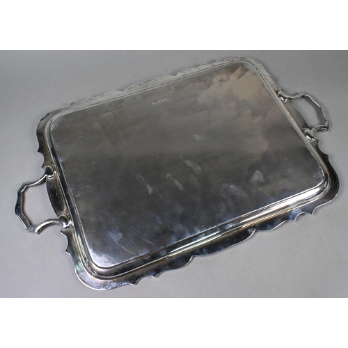 64 - A heavy quality silver two-handled tray with shaped rim, James Dixon & Son, Sheffield 1935, 70oz... 