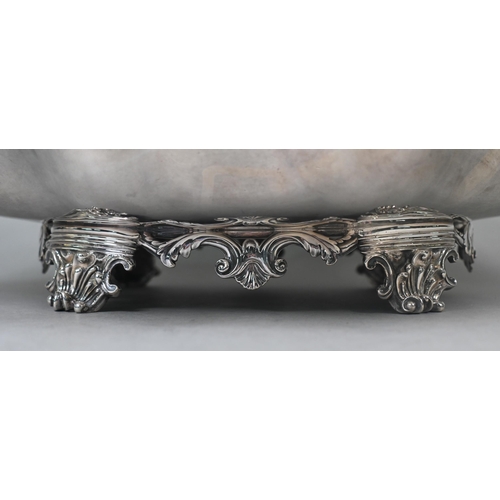 65 - Garrards: a very heavy quality George IV silver fruit basket with scrolling swing handle and lobed b... 