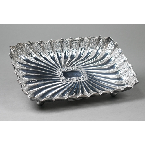 71 - A Victorian rectangular silver dish with reeded and engraved decoration, on ball feet, Fenton Brothe... 