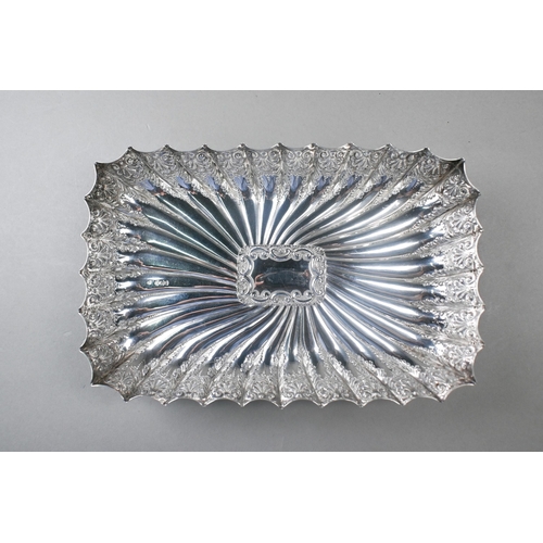 71 - A Victorian rectangular silver dish with reeded and engraved decoration, on ball feet, Fenton Brothe... 