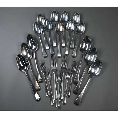 74 - A part set of George III Old English pattern flatware, comprising six tablespoons, nine dessert spoo... 