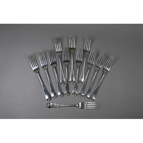 75 - A set of nine George III Old English pattern silver table forks, Eley, Fearn & Chawner, London 1... 