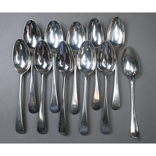 77 - A matched set of twelve mid Georgian Old English pattern silver tablespoons - various makers and dat... 