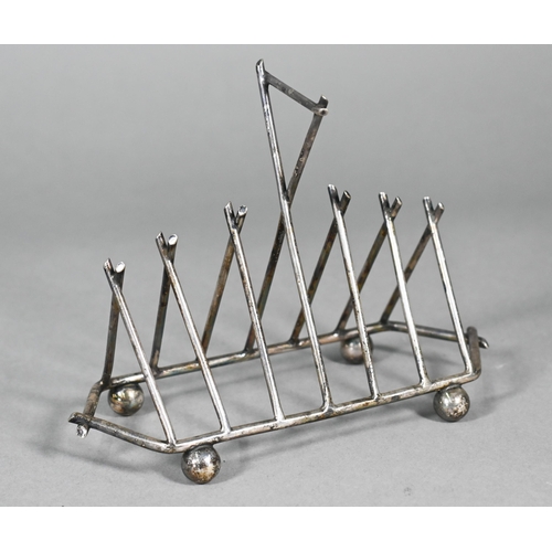 8 - A Victorian electroplated toast rack of triangular form, in the manner of Christopher Dresser, stamp... 