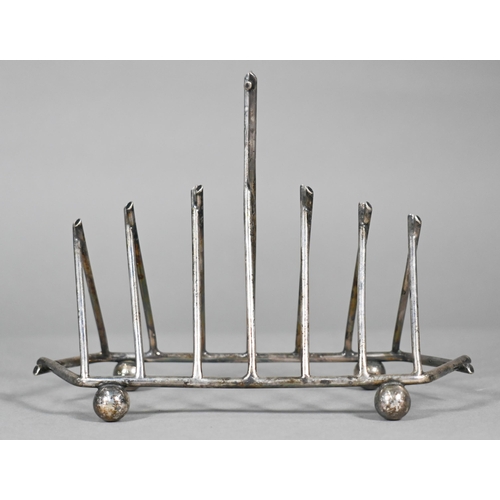 8 - A Victorian electroplated toast rack of triangular form, in the manner of Christopher Dresser, stamp... 