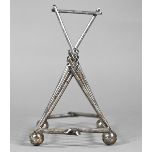 8 - A Victorian electroplated toast rack of triangular form, in the manner of Christopher Dresser, stamp... 