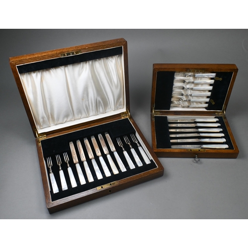 82 - A set of twelve silver dessert knives and forks with mother of pearl handles, C.W. Fletcher & So... 