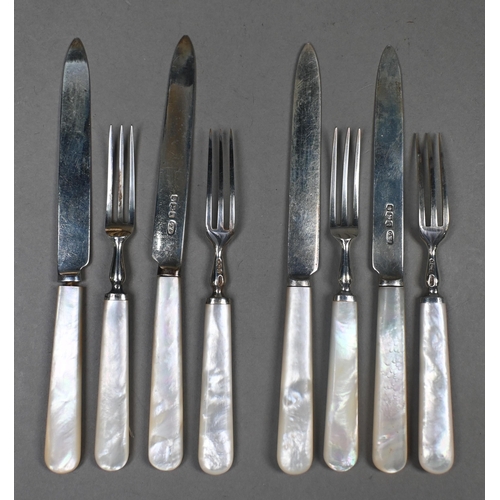 82 - A set of twelve silver dessert knives and forks with mother of pearl handles, C.W. Fletcher & So... 